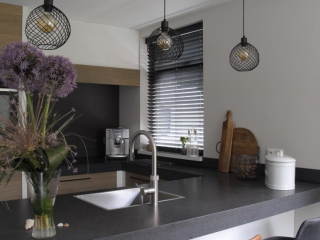 Met gezellig zitgedeelte Houten Keukens